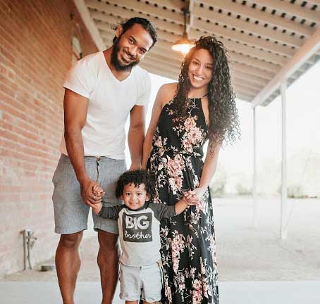 Photo of Benson Henderson and his wife, Maria Magana, and daughter.