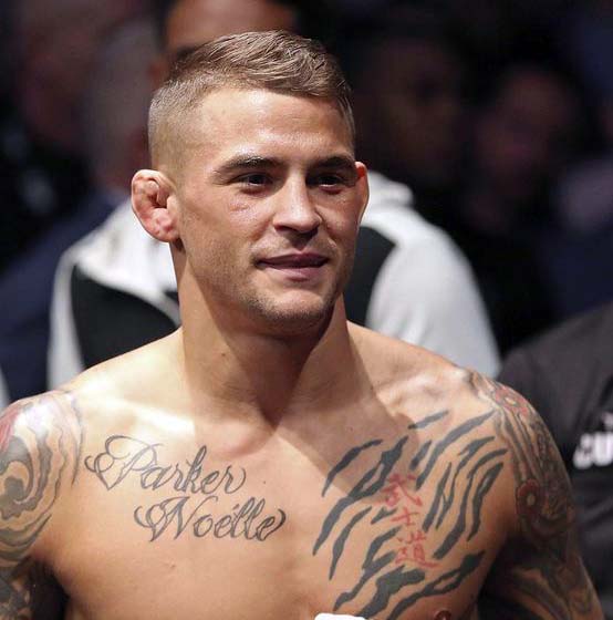 Photo of Dustin Poirier's tattoos in the chest.