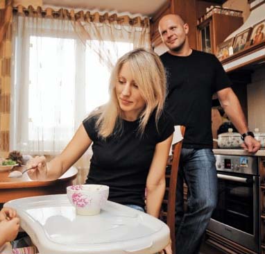 Photo of Fedor Emelianenko and his current wife, Oksana Emelianenko and his second ex-wife, Marina.